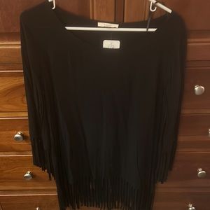 NWT black fringed top on bottom and sleeves.